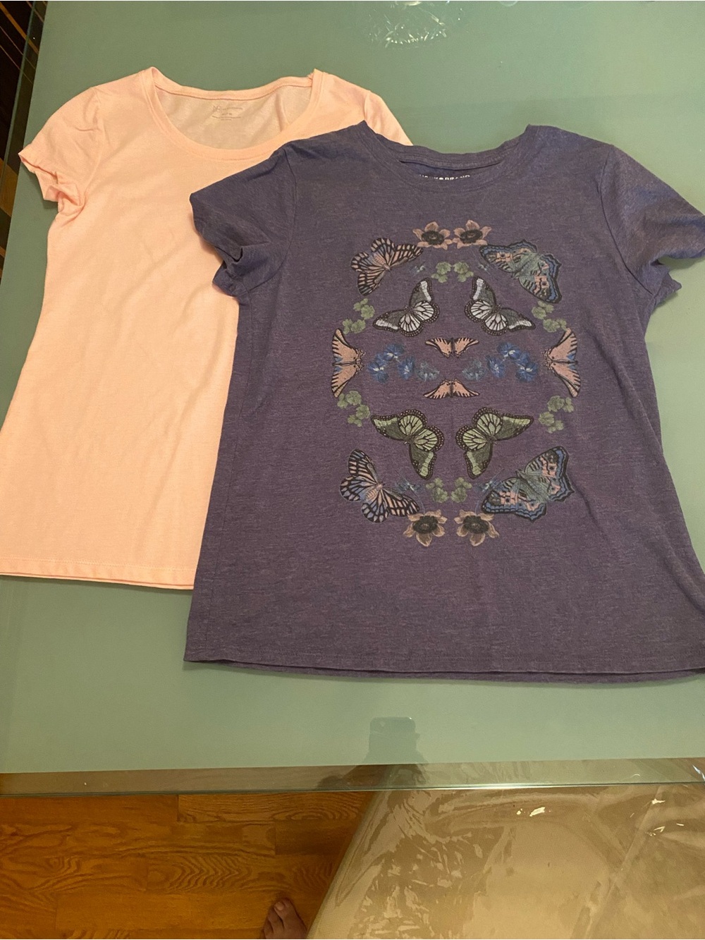 Two tees.  Lucky Brand purple and No Boundaries Light Pink both size M